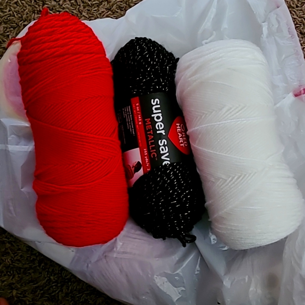 Yarn Lot of three skeins Red Metallic black and White all NEW never used acrylic
